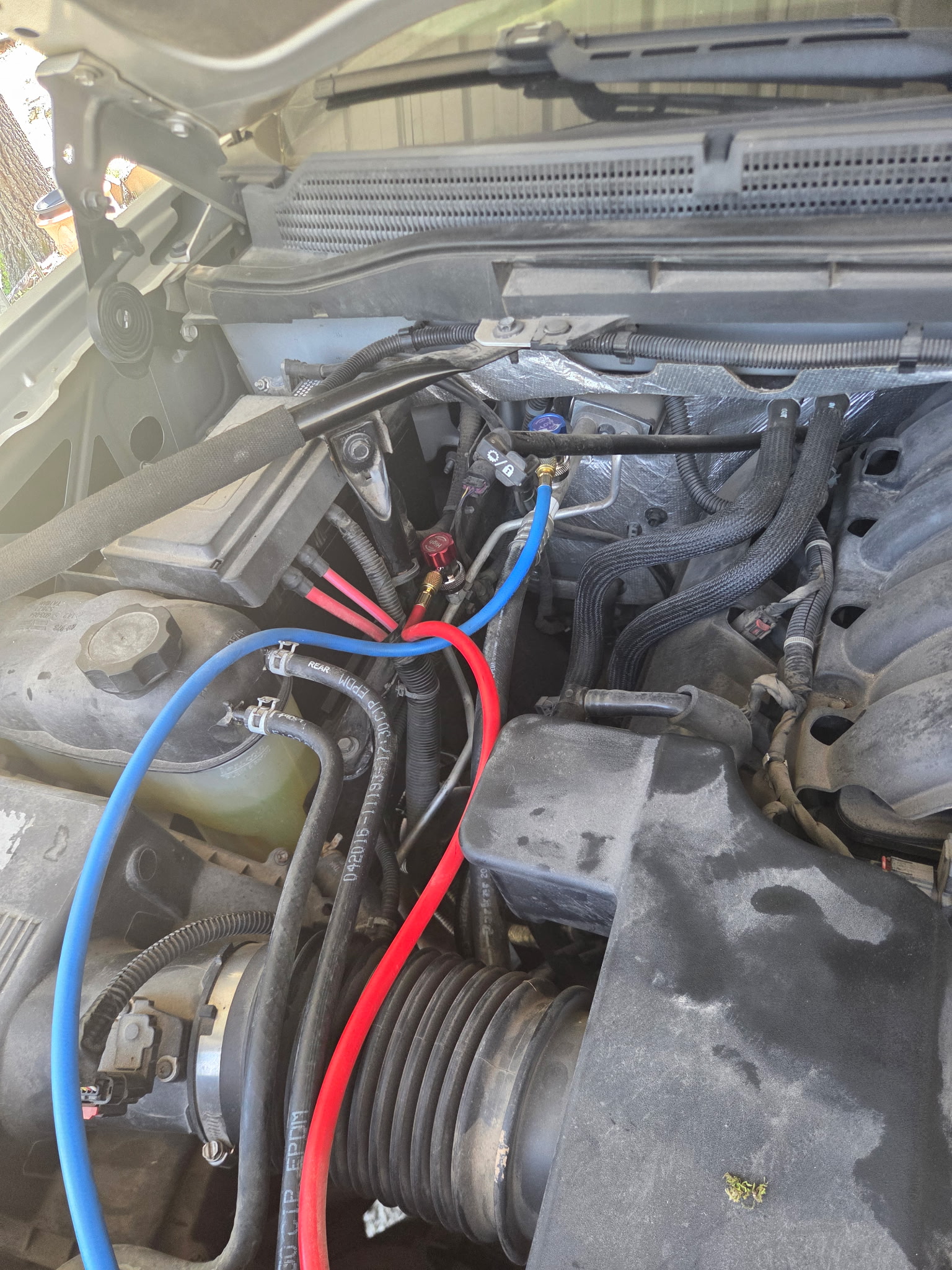 Engine bay with AC gauges